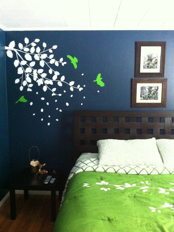 Dark blue bedroom with bright green accent
