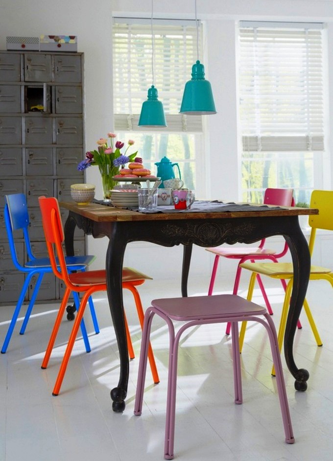 eclectic mix of dining chair colors and styles