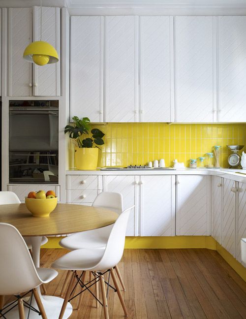 white and yellow wood kitchen
