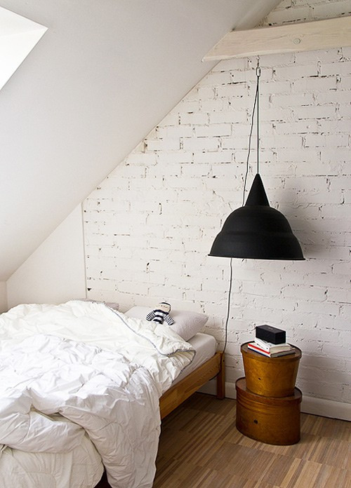Black Lamp In White Bedroom With Small Table