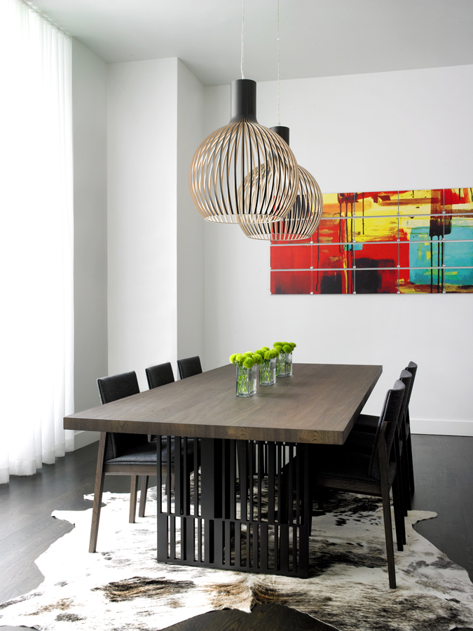 Dining Table with beautiful lamp and wall painting