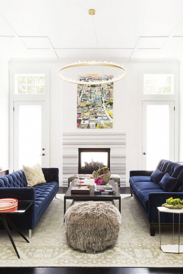 Ann Lowengart Interiors Modern Living Room in Norcal blue velvet sofas and quartz lined chandelier