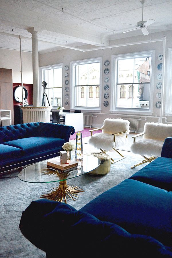 living room fuzzy chairs blue velvet sofas windows
