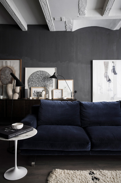 dark walls with blue sofa interior