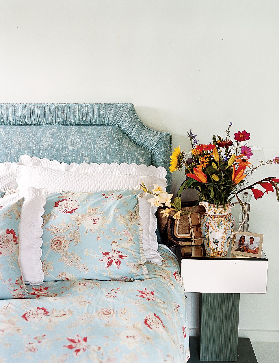 guest room at a family's compound off the coast of Maine features fresh wildflowers from a nearby farmer's market