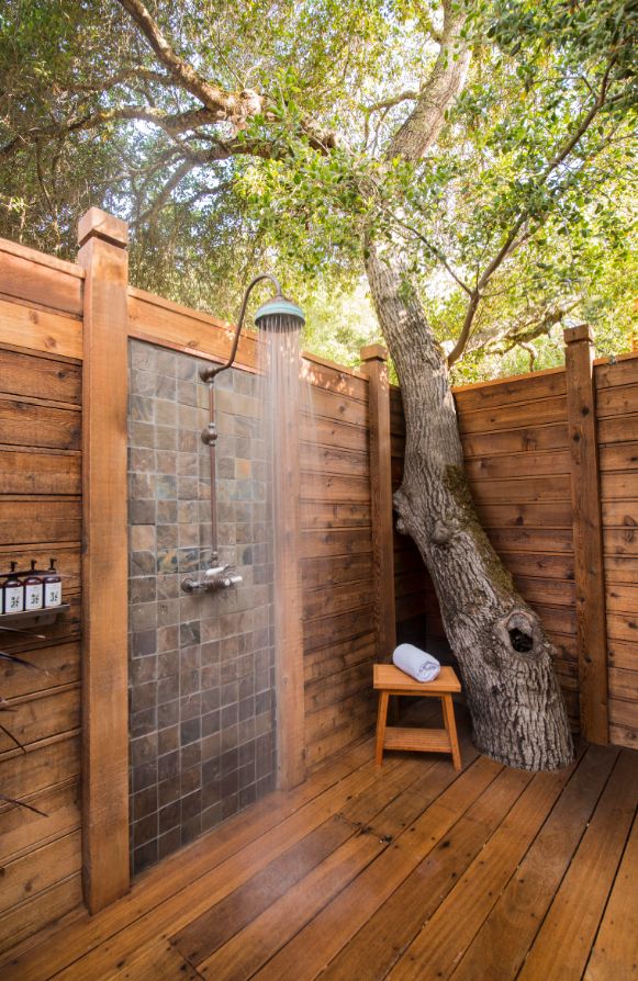 pecifically beneath the rain showers in its outdoor shower garden