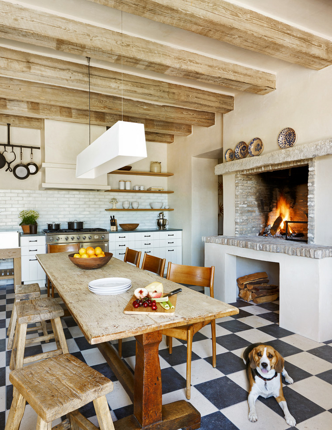 mismatched wooden stools and chairs oversized wooden beams