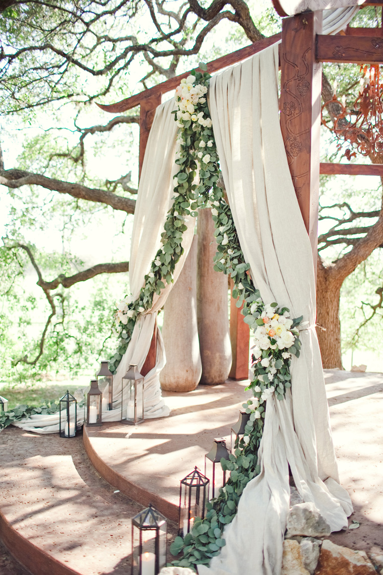 spring wedding ceremony draping eucalyptus garland