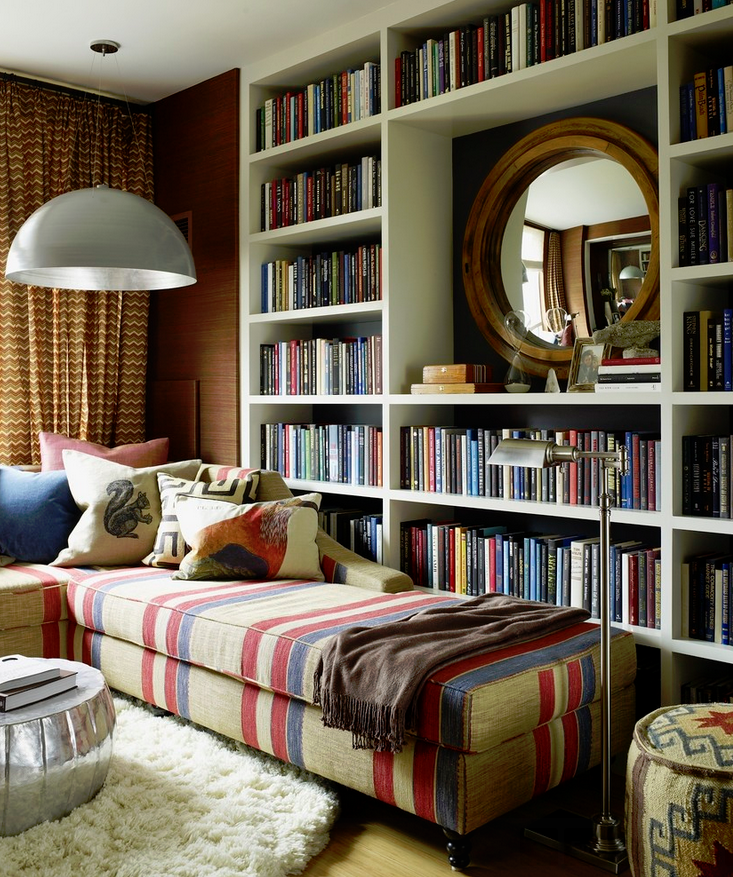 Inspiration for an eclectic family room in New York with a library