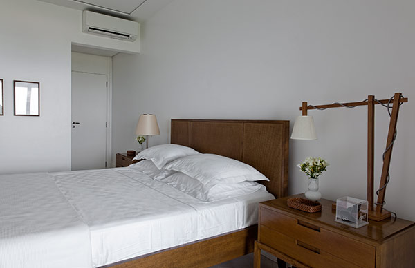 White bedroom with wood