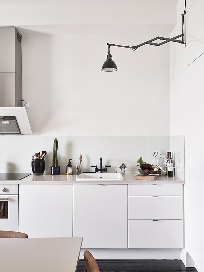 Wood, white and black in a warm mix Scandinavian Kitchen