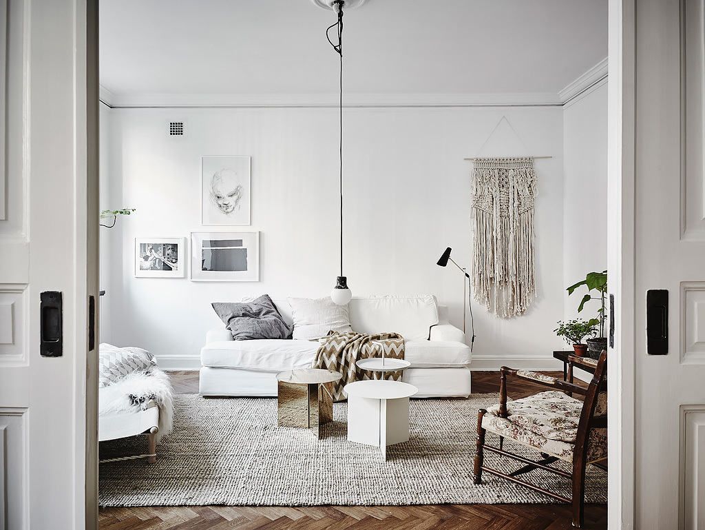 Amazing look living room with white sofa and rug