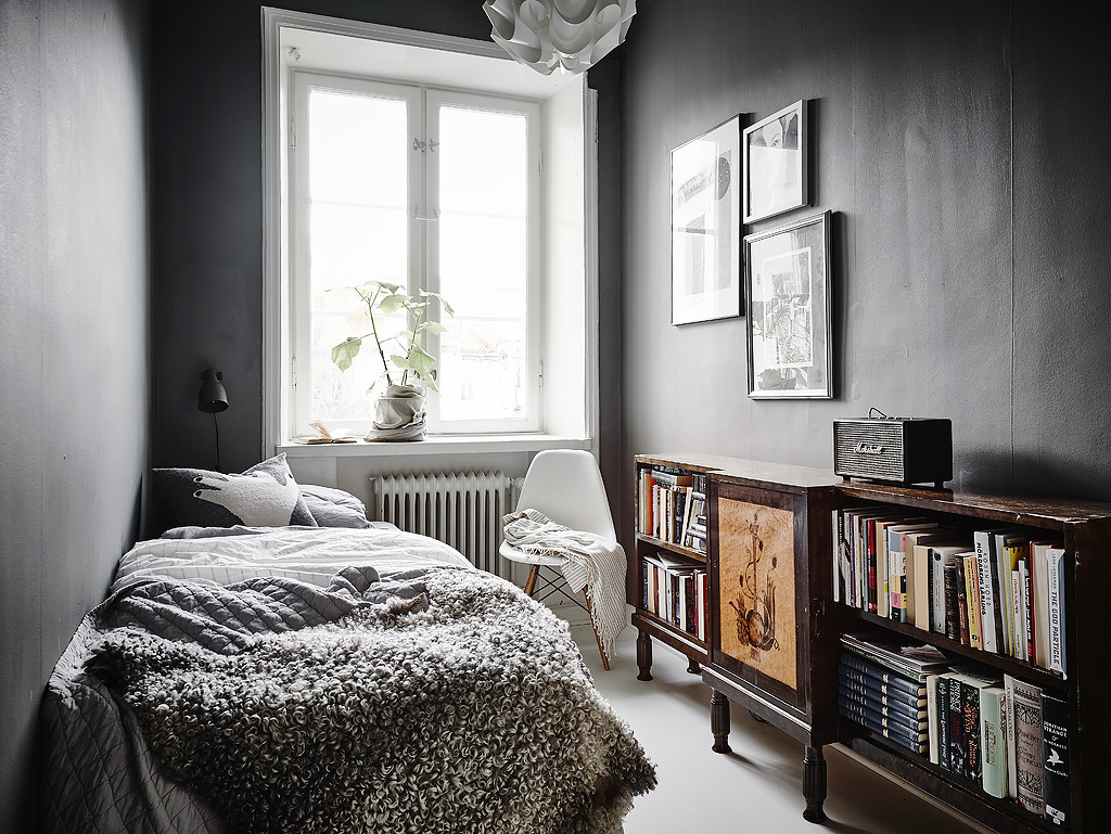 Small Space guest room with dark interior