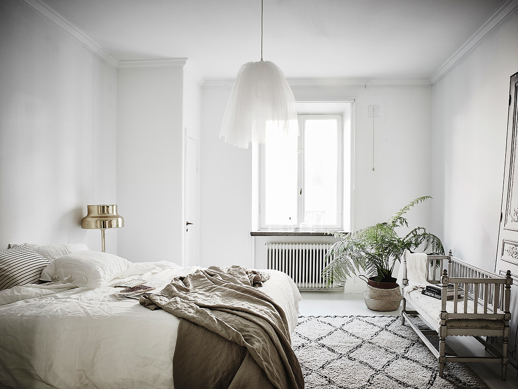 scandinavian white and vintage bedroom interior
