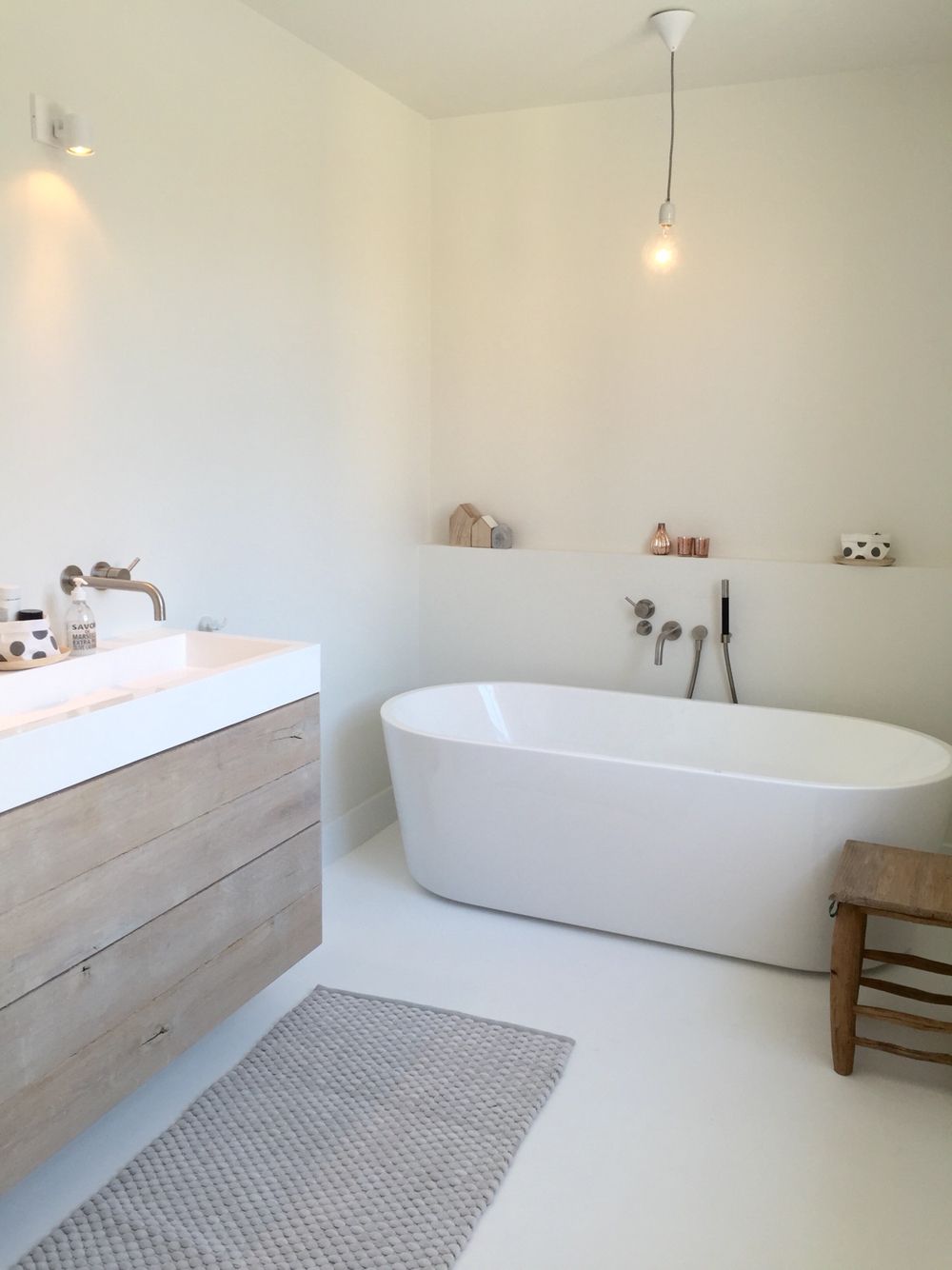 white and timber bathrooms