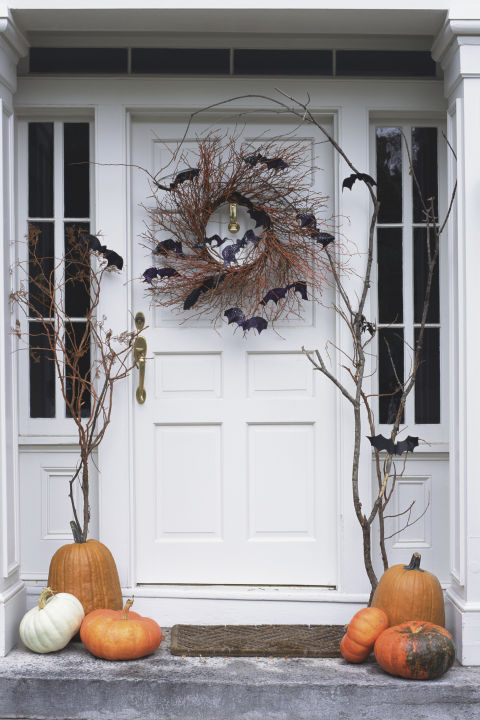 Hang rustic spooky wreath from your door for halloween decor