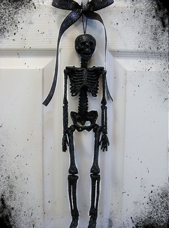 black skeleton and white door halloween decorations