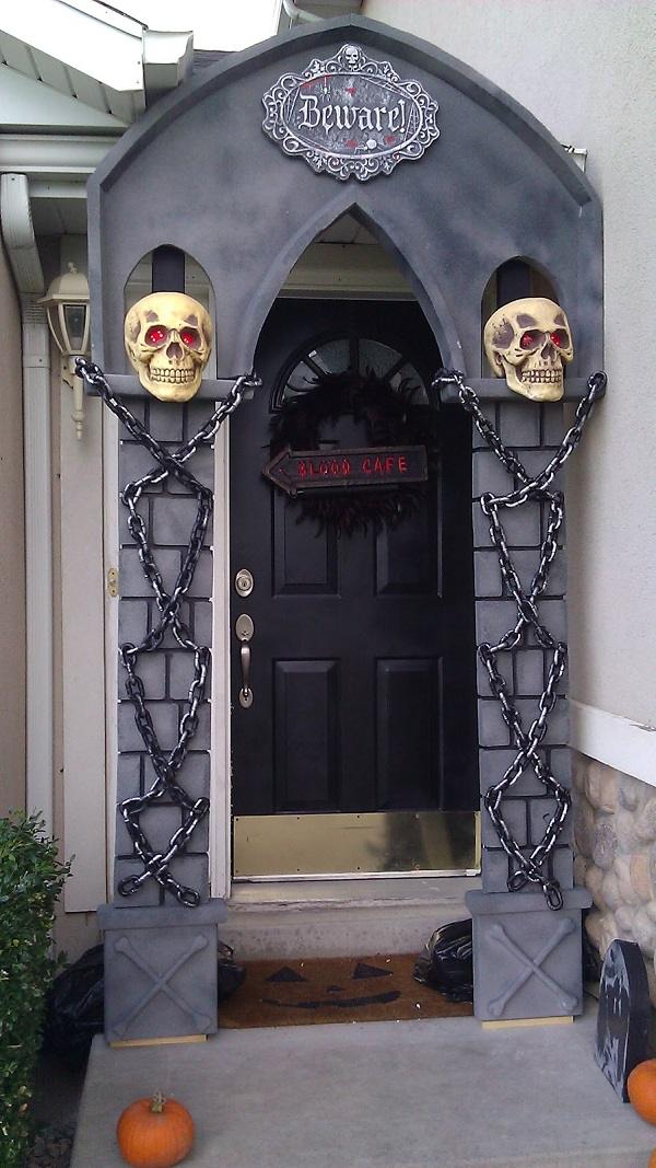 halloween decorating ideas front door props arch skulls