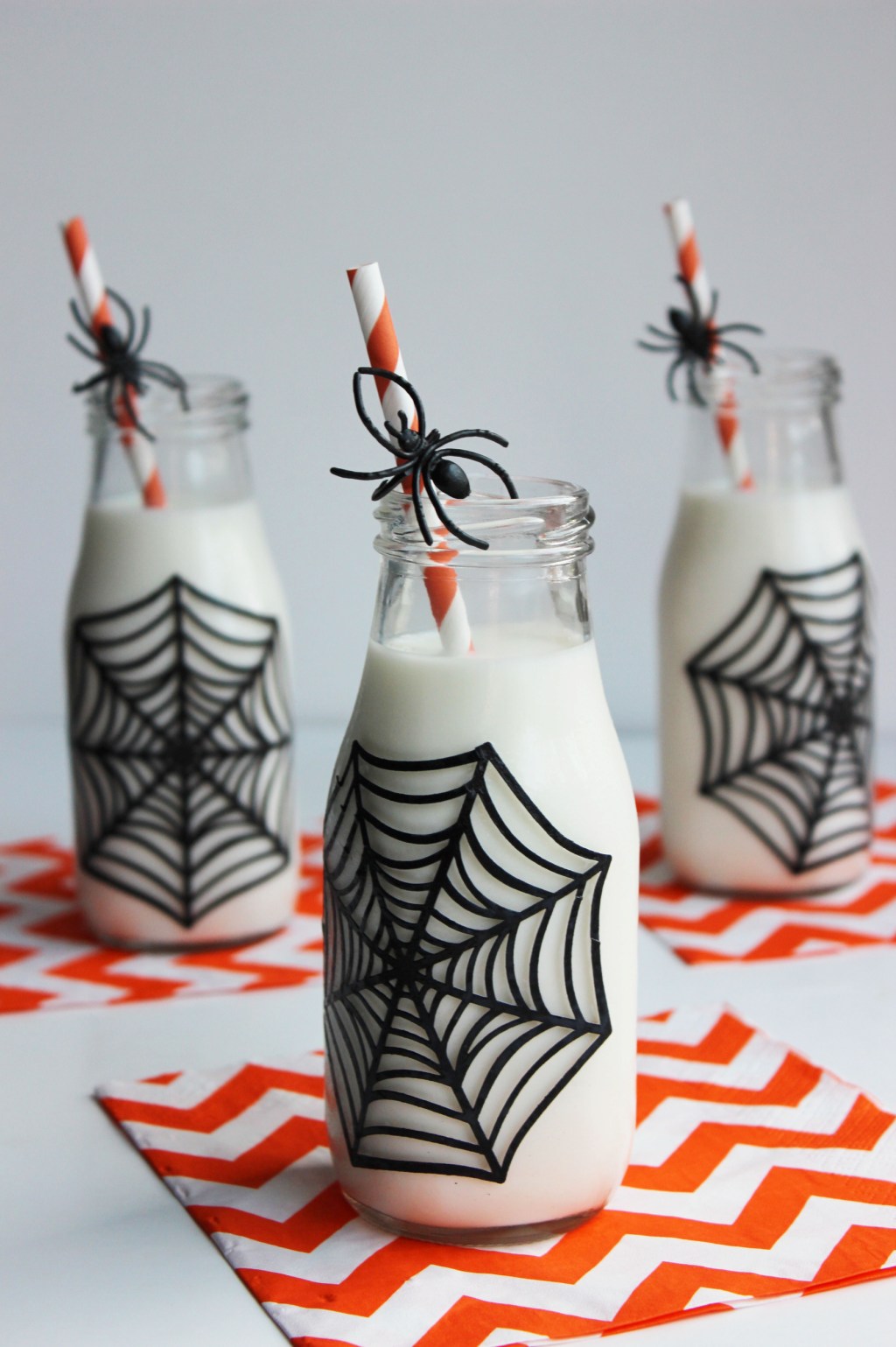 spider web milk bottle