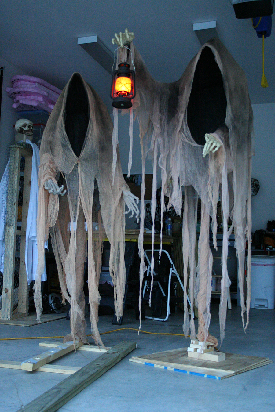 Cloaked Ghosts Halloween yard decoration