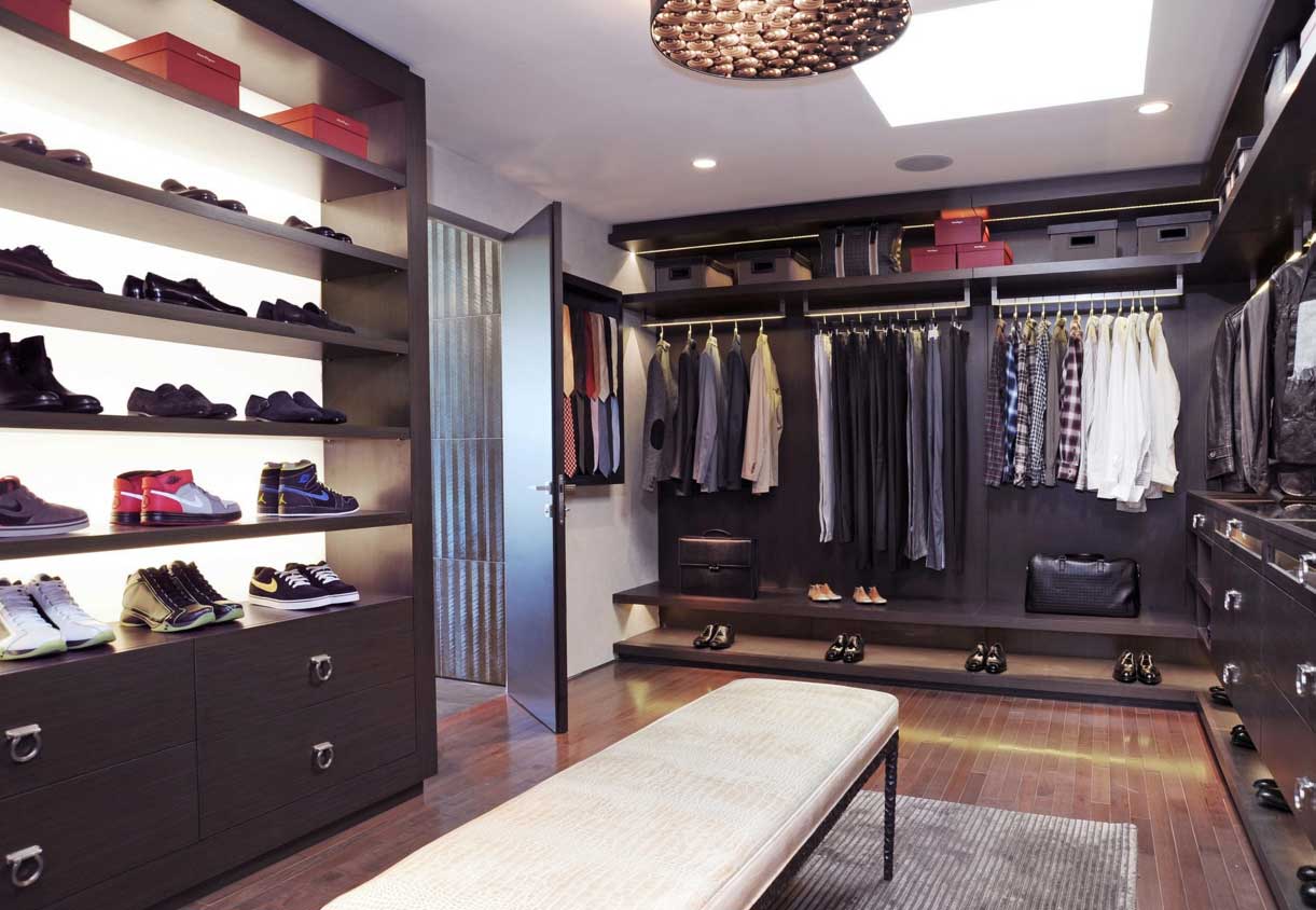 Luxury walk in closet storage ideas with seating area