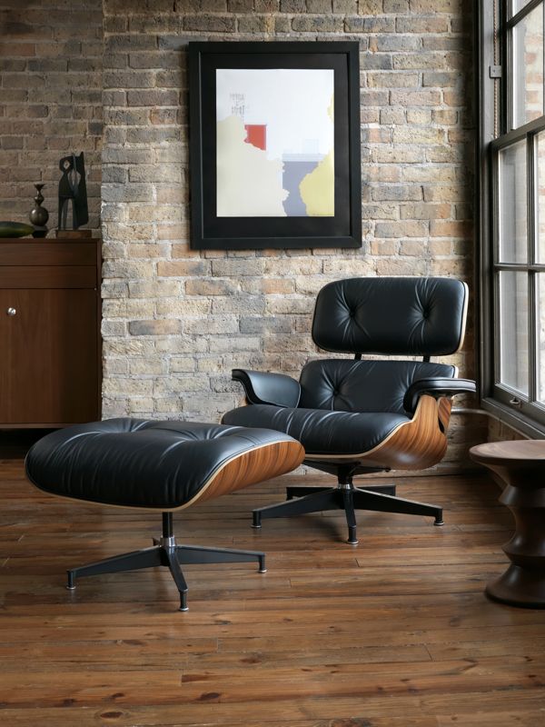 exposed brick and Eames lounge Chair