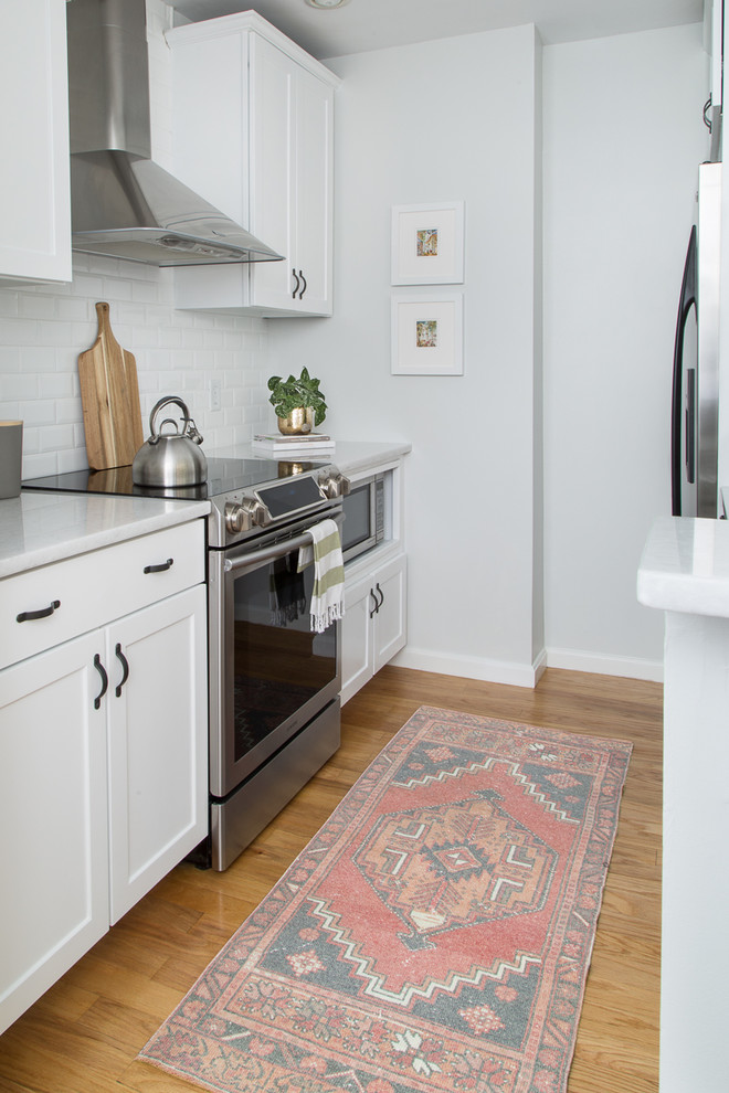 galley kitchen ideas white cabinets, subway tile backsplash, stainless steel appliances