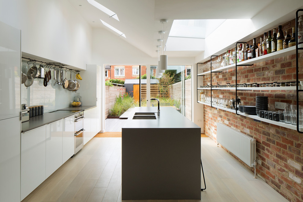 trendy single brick wall contemporary kitchen design