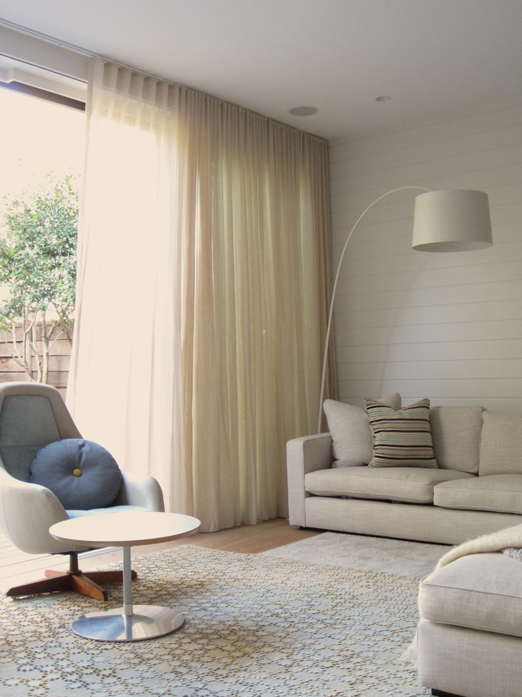 Large contemporary open concept living room Sheer curtains From ceiling