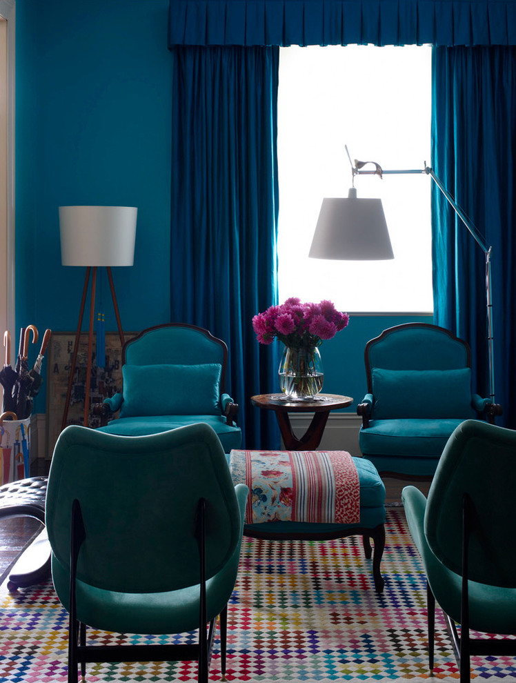 eclectic living room with blue walls