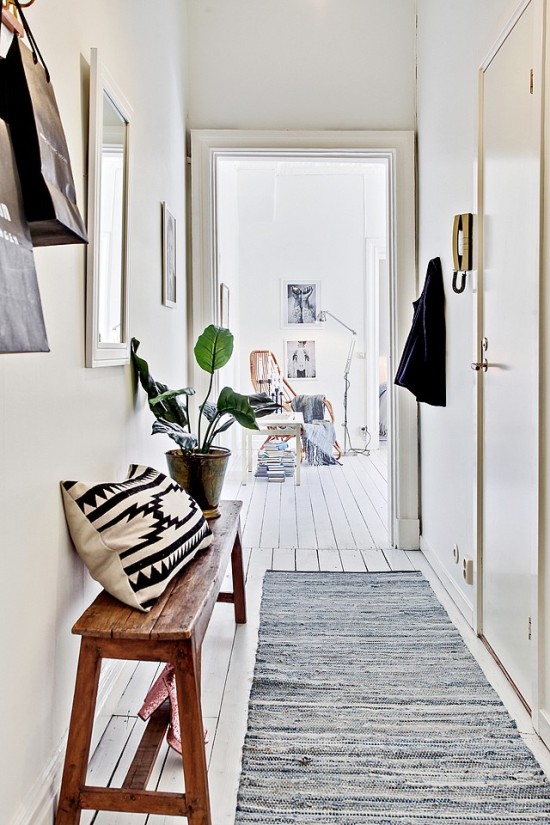 white walls hallway or entryway ideas decorate with plants