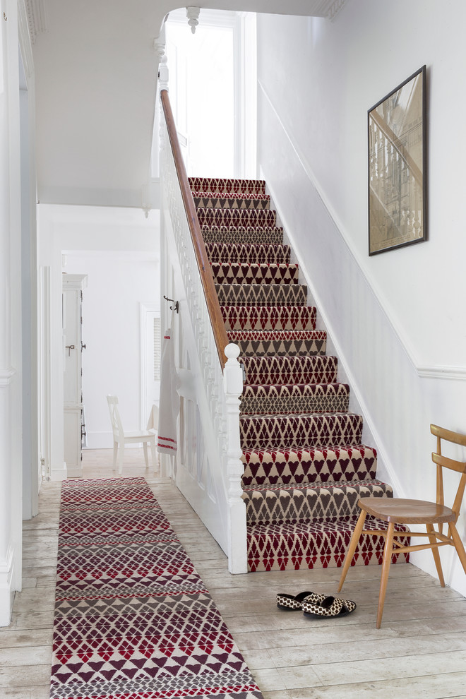 Elegant carpeted straight staircase