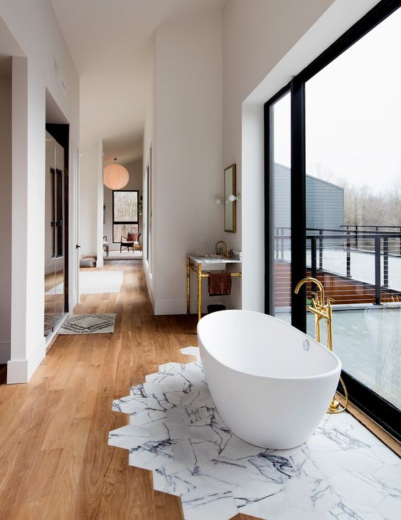 Freestanding Tub in Master Bathroom Hexagonal Marble Tiles in Walnut Floor