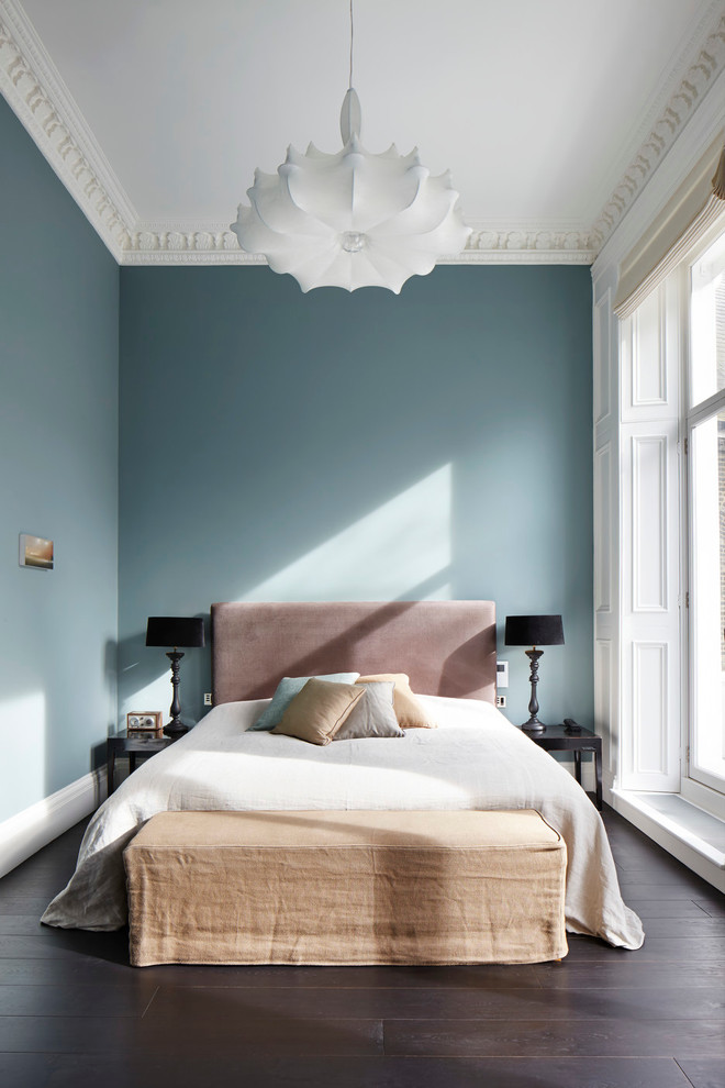 large master bedroom London with blue walls