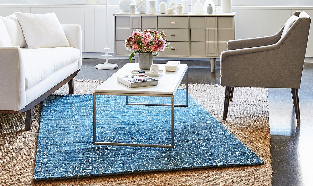 Add a carpet or some rugs to make your apartment more comfortable