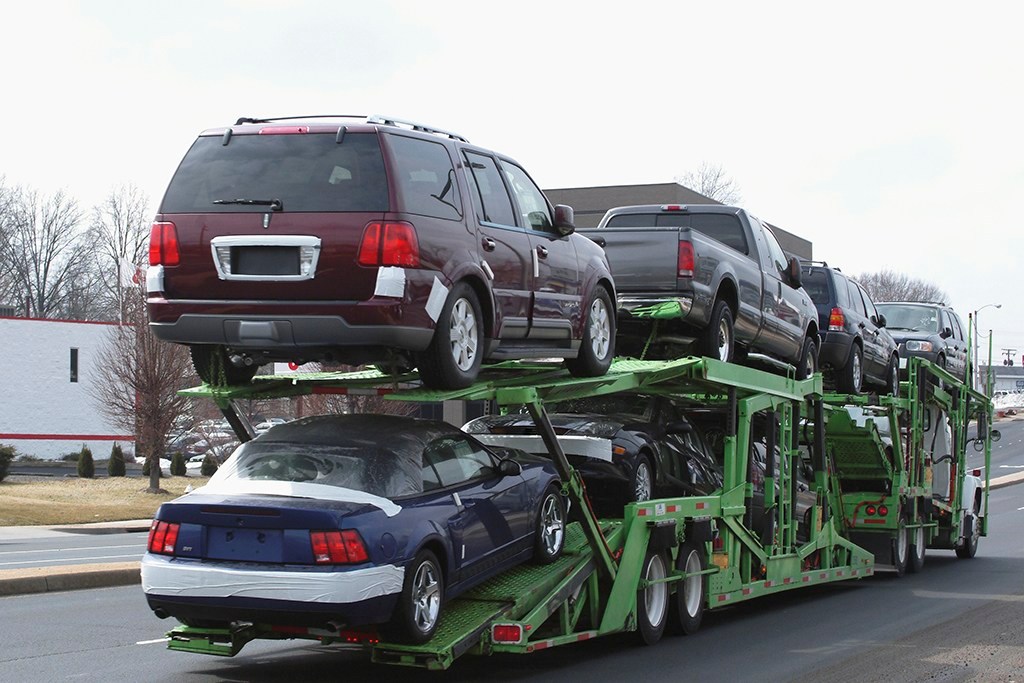 Close-up of cars on top of a truck