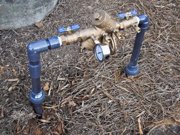 What causes backflow