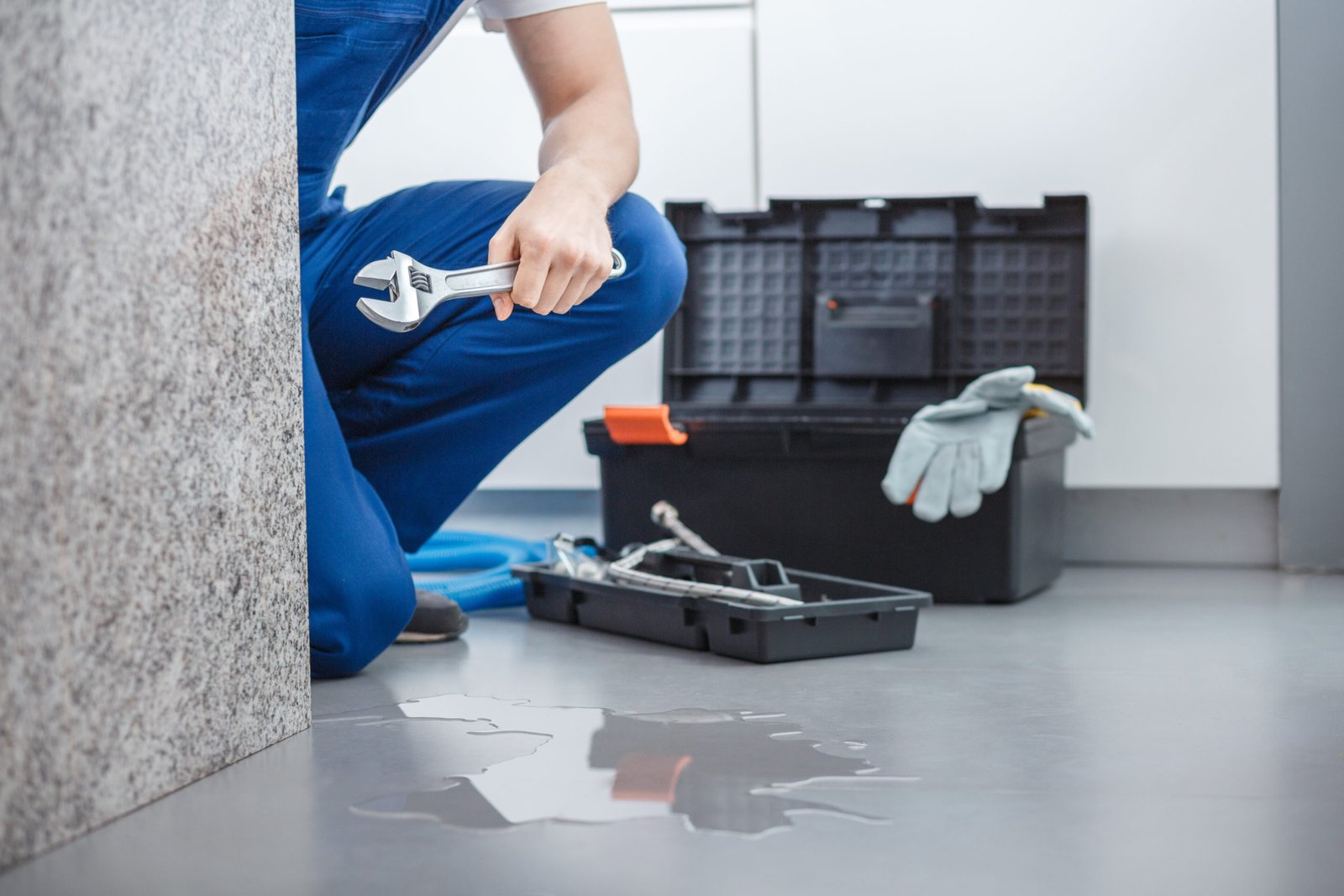 Plumber with wrench