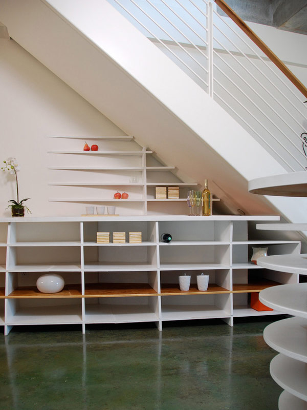 Stylish and chic shelves beneath the stairs