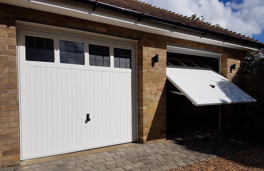 How To Fix A Bent Garage Door Track, How Do You Fix A Bent Garage Door